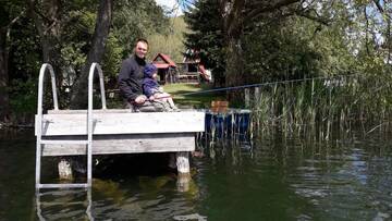 Фото номера Дом с 1 спальней Дома для отпуска Domek nad Jeziorem Parzeńskim г. Parzeńsko 30